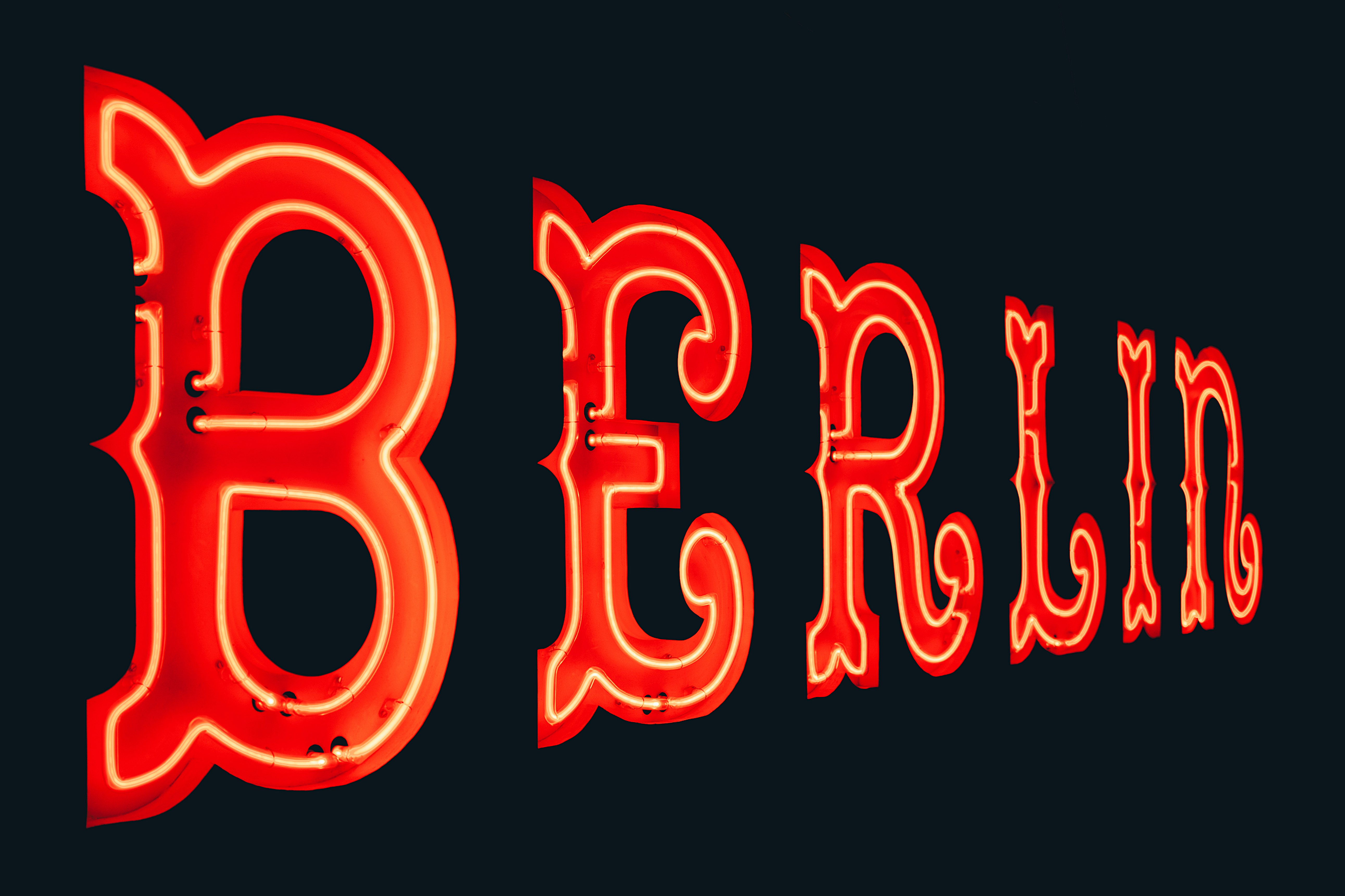 turned on red Berlin neon signage